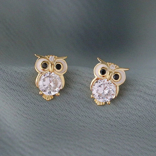 Gold owl stud earrings with sparkling crystals, perfect for jewelry websites, jewelry storage, vintage jewelry, and gifting for mom or jewelry lovers.