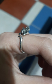 Adorable mouse-shaped ring with a wrap-around design, perfect for vintage jewelry lovers, jewelry designers, and fans of unique body jewelry. Great for jewelry storage cases, turquoise jewelry collections, and gifts like jewelry for mom or engraved jewelry. Explore jewelry websites for this gem jewelry design.