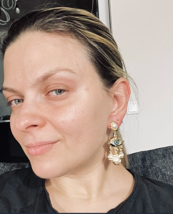 Unique eye and pearl drop earrings, ideal for jewelry storage, jewelry websites, vintage jewelry collections, and bold statement fashion for jewelry lovers.