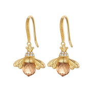 Bee-themed drop earrings with amber crystals and silver details, perfect for jewelry websites, jewelry storage, vintage jewelry, and nature-inspired fashion.
