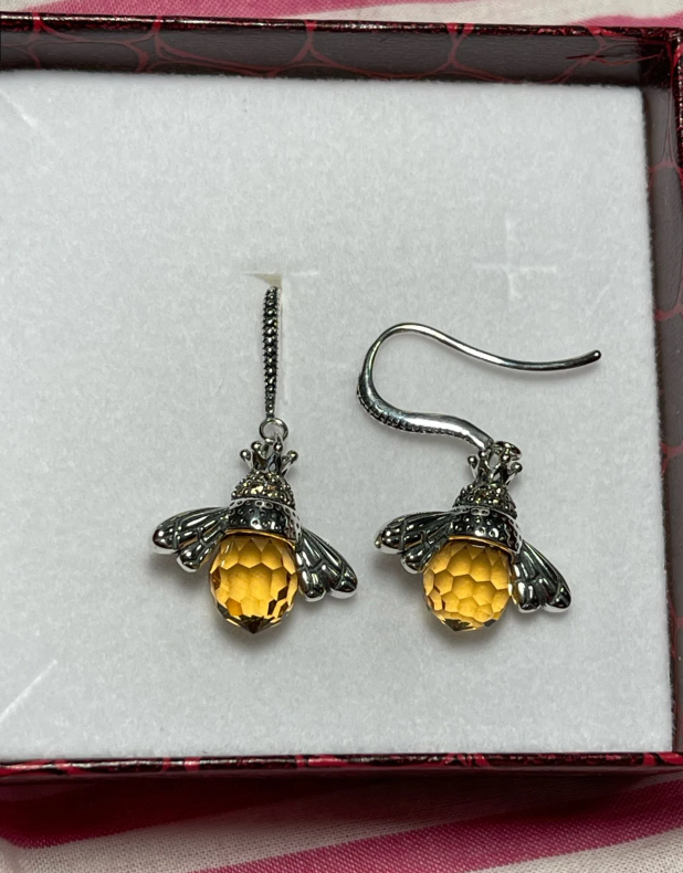 Bee-themed drop earrings with amber crystals and silver details, perfect for jewelry websites, jewelry storage, vintage jewelry, and nature-inspired fashion.
