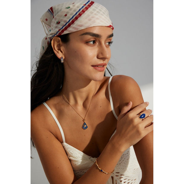 Luxurious blue enamel gold earrings with crystal accents, ideal for jewelry storage, designed by top jewelry designers, perfect for earrings piercing, jewelry for mom, and vintage jewelry collections. Suitable for body jewelry, gem jewelry, and jewelry with engraving or turquoise accents.