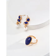 Gold ring with a bold blue gemstone, perfect for gem jewelry lovers, jewelry websites, and vintage jewelry enthusiasts. Ideal for jewelry storage, cleaning, and repair.