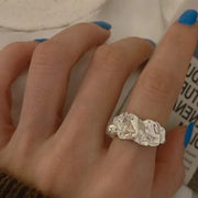 Bold silver chunky ring with a unique textured design, perfect for jewelry storage, jewelry websites, and vintage jewelry collections. Ideal for jewelry designers, jewelry cleaning, and showcasing alongside gem jewelry, diamond and jewelry collections, or turquoise jewelry. A statement piece for jewelry for mom gifts and modern jewelry brands.
