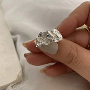 Bold silver chunky ring with a unique textured design, perfect for jewelry storage, jewelry websites, and vintage jewelry collections. Ideal for jewelry designers, jewelry cleaning, and showcasing alongside gem jewelry, diamond and jewelry collections, or turquoise jewelry. A statement piece for jewelry for mom gifts and modern jewelry brands.