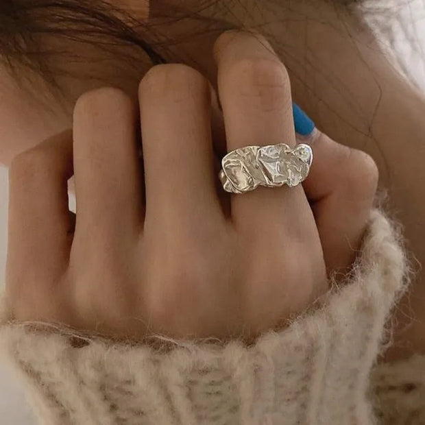 Bold silver chunky ring with a unique textured design, perfect for jewelry storage, jewelry websites, and vintage jewelry collections. Ideal for jewelry designers, jewelry cleaning, and showcasing alongside gem jewelry, diamond and jewelry collections, or turquoise jewelry. A statement piece for jewelry for mom gifts and modern jewelry brands.