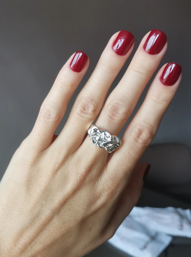 Bold silver chunky ring with a unique textured design, perfect for jewelry storage, jewelry websites, and vintage jewelry collections. Ideal for jewelry designers, jewelry cleaning, and showcasing alongside gem jewelry, diamond and jewelry collections, or turquoise jewelry. A statement piece for jewelry for mom gifts and modern jewelry brands.