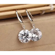 Crystal leaf earrings in silver and gold, perfect for jewelry websites, jewelry storage, vintage jewelry, gifting for mom, and nature-inspired fashion.