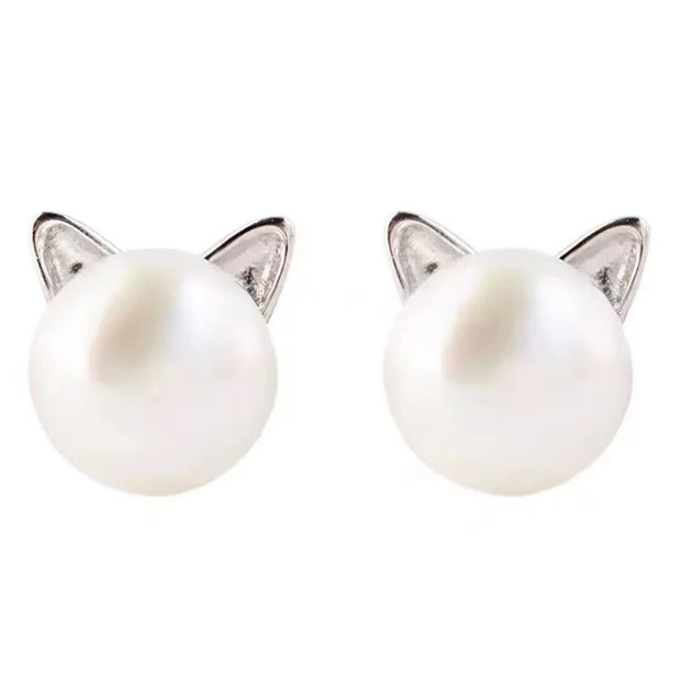 Adorable pearl stud earrings with silver cat ear accents, ideal for jewelry storage, vintage jewelry collections, or display on jewelry websites. Perfect for earrings piercing enthusiasts, jewelry cleaning tips, jewelry for mom gifts, and gem jewelry lovers. Great for permanent jewelry collections or pairing with body jewelry and earrings rings styles.