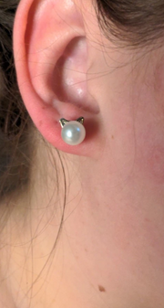 Adorable pearl stud earrings with silver cat ear accents, ideal for jewelry storage, vintage jewelry collections, or display on jewelry websites. Perfect for earrings piercing enthusiasts, jewelry cleaning tips, jewelry for mom gifts, and gem jewelry lovers. Great for permanent jewelry collections or pairing with body jewelry and earrings rings styles.