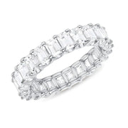 Elegant baguette diamond rings with gold and silver bands, ideal for jewelry designers, jewelry websites, and storage in a luxurious jewelry case.