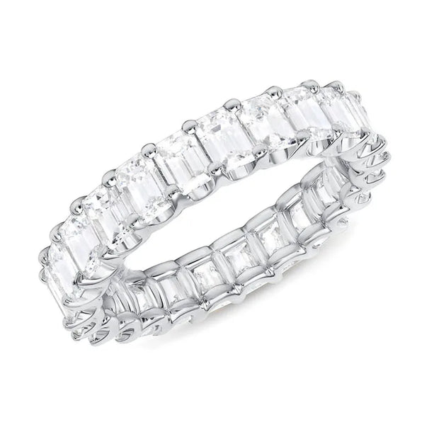 Elegant baguette diamond rings with gold and silver bands, ideal for jewelry designers, jewelry websites, and storage in a luxurious jewelry case.