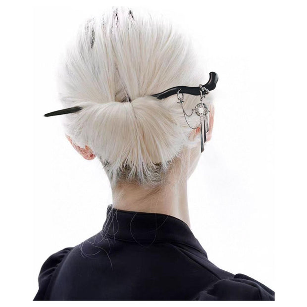 Elegant black hair stick with silver charms for mature women hairstyles, ideal for jewelry storage and jewelry cleaning. Perfect for jewelry designers, jewelry websites, and vintage jewelry lovers. Great for earrings piercing and body jewelry plus, as well as for those interested in permanent jewelry and jewelry repair close to me. A stylish addition for jewelry with turquoise, gem jewelry, and jewelry brands enthusiasts.