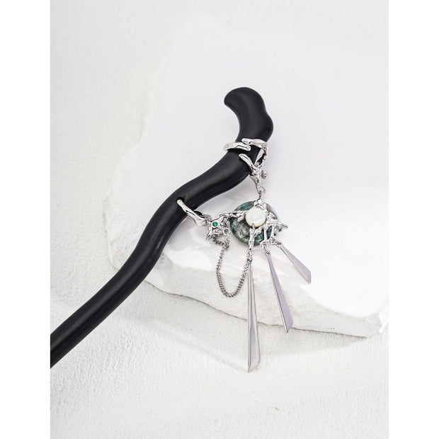 Elegant black hair stick with silver charms for mature women hairstyles, ideal for jewelry storage and jewelry cleaning. Perfect for jewelry designers, jewelry websites, and vintage jewelry lovers. Great for earrings piercing and body jewelry plus, as well as for those interested in permanent jewelry and jewelry repair close to me. A stylish addition for jewelry with turquoise, gem jewelry, and jewelry brands enthusiasts.