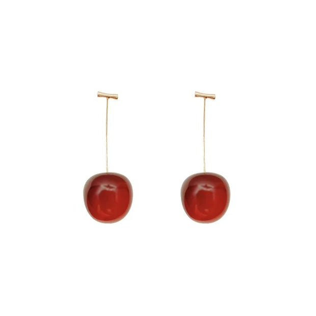 Cherry-inspired drop earrings with red stones and gold accents, perfect for jewelry websites, jewelry storage, vintage jewelry, and gifting for mom or jewelry lovers.