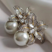 Floral pearl and crystal earrings designed for timeless elegance, perfect for jewelry cleaning, vintage jewelry enthusiasts, and top jewelry websites. Ideal for earrings piercing, earrings rings, or gifting for mom.