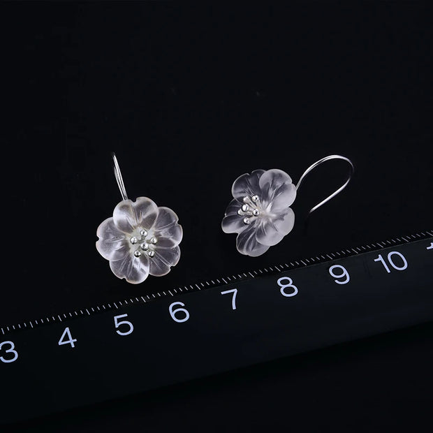 Floral crystal earrings with gold accents, perfect for jewelry websites, jewelry storage, vintage jewelry, earrings piercing, and as a gift for mom or nature lovers.