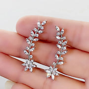 Elegant floral vine ear cuff earring for "jewelry storage," "jewelry websites," and "vintage jewelry." Perfect for "earrings piercing" or "body jewelry," designed by top "jewelry designers" with timeless charm.