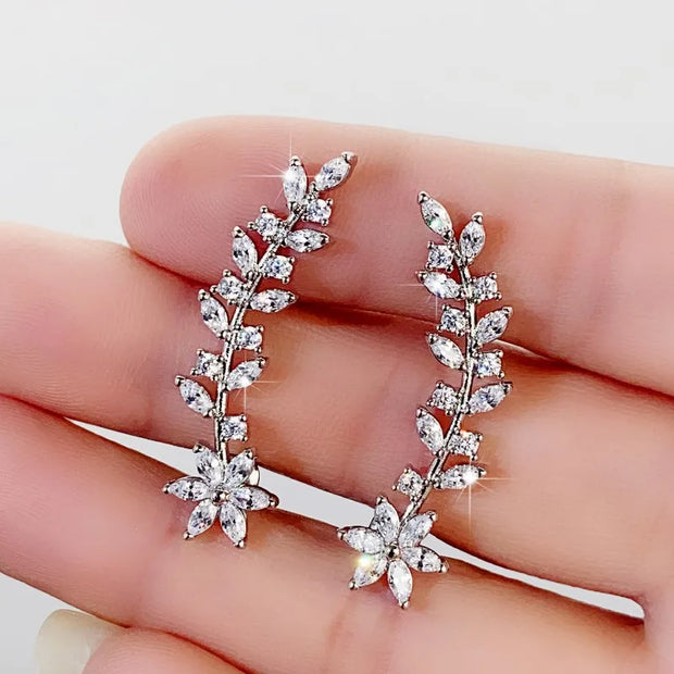 Elegant floral vine ear cuff earring for "jewelry storage," "jewelry websites," and "vintage jewelry." Perfect for "earrings piercing" or "body jewelry," designed by top "jewelry designers" with timeless charm.