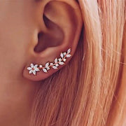 Elegant floral vine ear cuff earring for "jewelry storage," "jewelry websites," and "vintage jewelry." Perfect for "earrings piercing" or "body jewelry," designed by top "jewelry designers" with timeless charm.