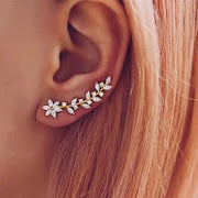 Elegant floral vine ear cuff earring for "jewelry storage," "jewelry websites," and "vintage jewelry." Perfect for "earrings piercing" or "body jewelry," designed by top "jewelry designers" with timeless charm.