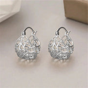 Gold filigree hoop earrings with intricate designs, perfect for jewelry storage, jewelry websites, vintage jewelry, and gifting for mom or elegant occasions.