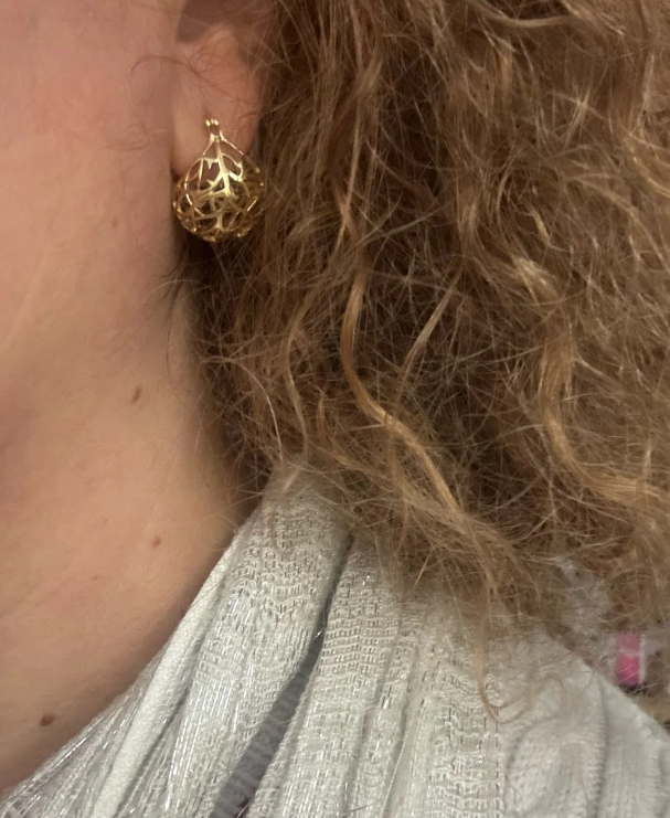 Gold filigree hoop earrings with intricate designs, perfect for jewelry storage, jewelry websites, vintage jewelry, and gifting for mom or elegant occasions.