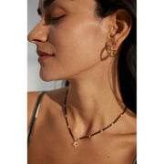 Gold hoop earrings with diamond accents for pierced ears, ideal for jewelry storage, designed by top jewelry designers. Perfect for vintage jewelry lovers or moms seeking timeless jewelry pieces. Explore diamond and jewelry collections, including turquoise jewelry, body jewelry, and more on leading jewelry websites.