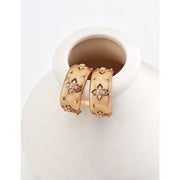 Gold hoop earrings with diamond accents for pierced ears, ideal for jewelry storage, designed by top jewelry designers. Perfect for vintage jewelry lovers or moms seeking timeless jewelry pieces. Explore diamond and jewelry collections, including turquoise jewelry, body jewelry, and more on leading jewelry websites.