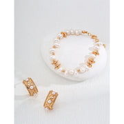 Vintage gold cuff earrings with pearls, ideal for earrings piercing, jewelry storage in a jewelry case, and perfect for mature women hairstyles; timeless jewelry for mom by top jewelry brands.