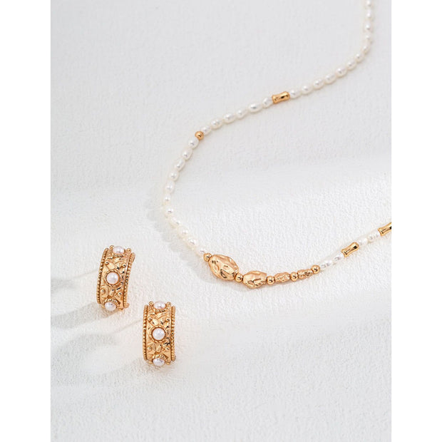Vintage gold cuff earrings with pearls, ideal for earrings piercing, jewelry storage in a jewelry case, and perfect for mature women hairstyles; timeless jewelry for mom by top jewelry brands.