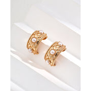 Vintage gold cuff earrings with pearls, ideal for earrings piercing, jewelry storage in a jewelry case, and perfect for mature women hairstyles; timeless jewelry for mom by top jewelry brands.