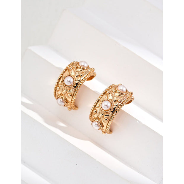 Vintage gold cuff earrings with pearls, ideal for earrings piercing, jewelry storage in a jewelry case, and perfect for mature women hairstyles; timeless jewelry for mom by top jewelry brands.