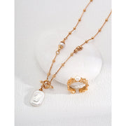 Elegant gold necklace with rectangular pearl pendant, perfect for jewelry storage and showcasing on jewelry websites. A timeless piece for mature women hairstyles, earrings piercing, or body jewelry collections. Ideal for jewelry designers, vintage jewelry enthusiasts, and lovers of turquoise jewelry or gem jewelry.