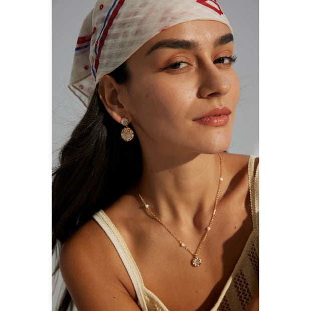 Elegant gold and silver necklaces with intricate pendants, ideal for jewelry storage, designed by expert jewelry designers, featured on top jewelry websites, perfect for gifting or pairing with vintage jewelry, turquoise jewelry, or emerald ring jewelry.