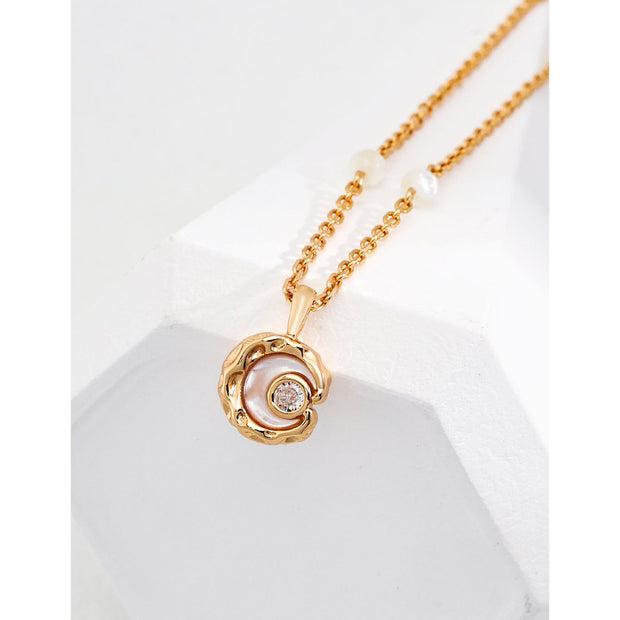 Elegant gold and silver necklaces with intricate pendants, ideal for jewelry storage, designed by expert jewelry designers, featured on top jewelry websites, perfect for gifting or pairing with vintage jewelry, turquoise jewelry, or emerald ring jewelry.