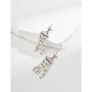 Gold and silver pearl dangle earrings for jewelry storage, designed by top jewelry designers, perfect for body jewelry lovers, earrings piercing enthusiasts, and vintage jewelry collectors. Discover gem jewelry with timeless beauty, ideal for mature women hairstyles or gifting as jewelry for mom. Shop earrings rings and jewelry brands on leading jewelry websites.