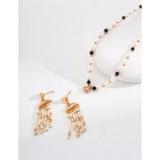 Gold and silver pearl dangle earrings for jewelry storage, designed by top jewelry designers, perfect for body jewelry lovers, earrings piercing enthusiasts, and vintage jewelry collectors. Discover gem jewelry with timeless beauty, ideal for mature women hairstyles or gifting as jewelry for mom. Shop earrings rings and jewelry brands on leading jewelry websites.