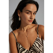 Gold and silver pearl dangle earrings for jewelry storage, designed by top jewelry designers, perfect for body jewelry lovers, earrings piercing enthusiasts, and vintage jewelry collectors. Discover gem jewelry with timeless beauty, ideal for mature women hairstyles or gifting as jewelry for mom. Shop earrings rings and jewelry brands on leading jewelry websites.