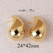 Gold teardrop earrings for earrings piercing, jewelry storage, vintage jewelry, jewelry websites, and jewelry for mom. Perfect for elegant and timeless looks