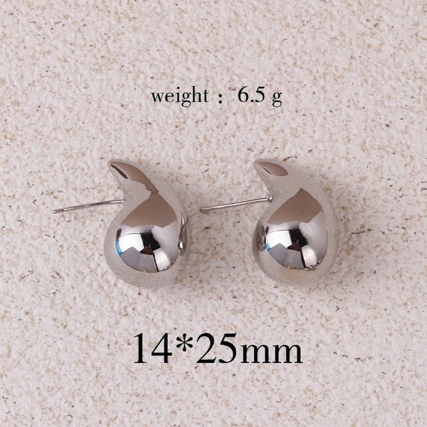 Gold teardrop earrings for earrings piercing, jewelry storage, vintage jewelry, jewelry websites, and jewelry for mom. Perfect for elegant and timeless looks
