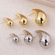Gold teardrop earrings for earrings piercing, jewelry storage, vintage jewelry, jewelry websites, and jewelry for mom. Perfect for elegant and timeless looks