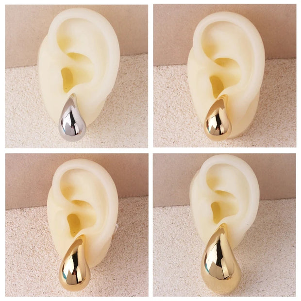 Gold teardrop earrings for earrings piercing, jewelry storage, vintage jewelry, jewelry websites, and jewelry for mom. Perfect for elegant and timeless looks