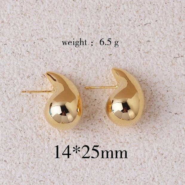 Gold teardrop earrings for earrings piercing, jewelry storage, vintage jewelry, jewelry websites, and jewelry for mom. Perfect for elegant and timeless looks