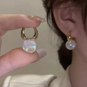 Heart-shaped pearl earrings for jewelry cleaning, earrings piercing, and jewelry storage. Perfect for jewelry designers, vintage jewelry, and jewelry for mom gifts.