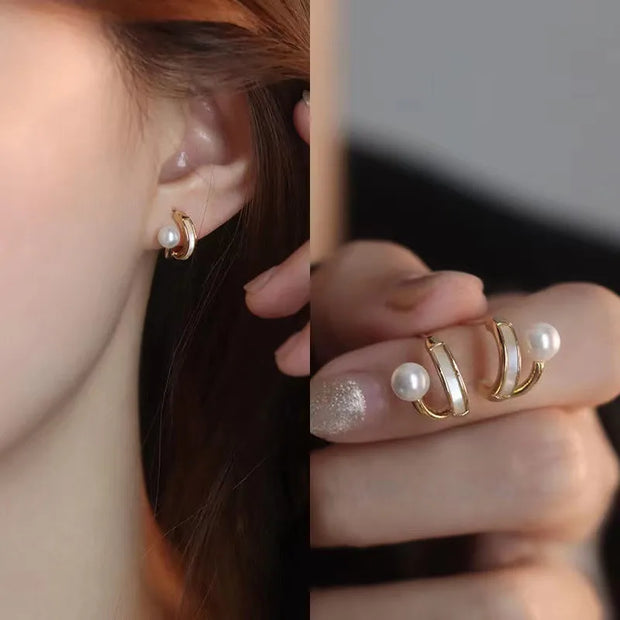 Heart-shaped pearl earrings for jewelry cleaning, earrings piercing, and jewelry storage. Perfect for jewelry designers, vintage jewelry, and jewelry for mom gifts.