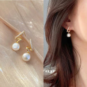 Heart-shaped pearl earrings for jewelry cleaning, earrings piercing, and jewelry storage. Perfect for jewelry designers, vintage jewelry, and jewelry for mom gifts.