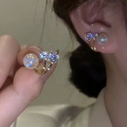 Heart-shaped pearl earrings for jewelry cleaning, earrings piercing, and jewelry storage. Perfect for jewelry designers, vintage jewelry, and jewelry for mom gifts.