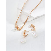 Elegant pearl drop earrings in gold and silver, ideal for jewelry storage, designed by top jewelry designers, perfect for vintage jewelry enthusiasts, earrings piercing styles, or pairing with turquoise jewelry, gem jewelry, or emerald ring jewelry.
