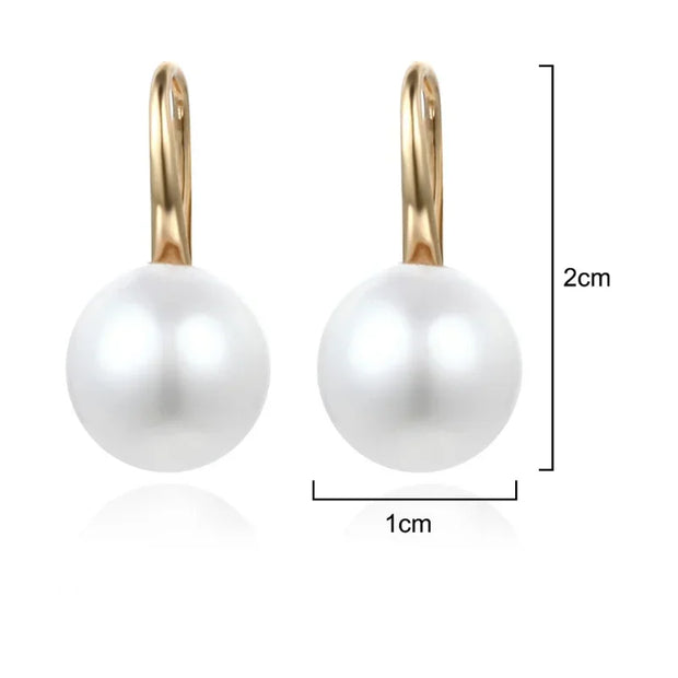 Elegant silver drop earrings with luminous freshwater pearls, ideal for earrings piercing, jewelry storage, vintage jewelry collections, and gifting. Perfect for jewelry websites or body jewelry enthusiasts.